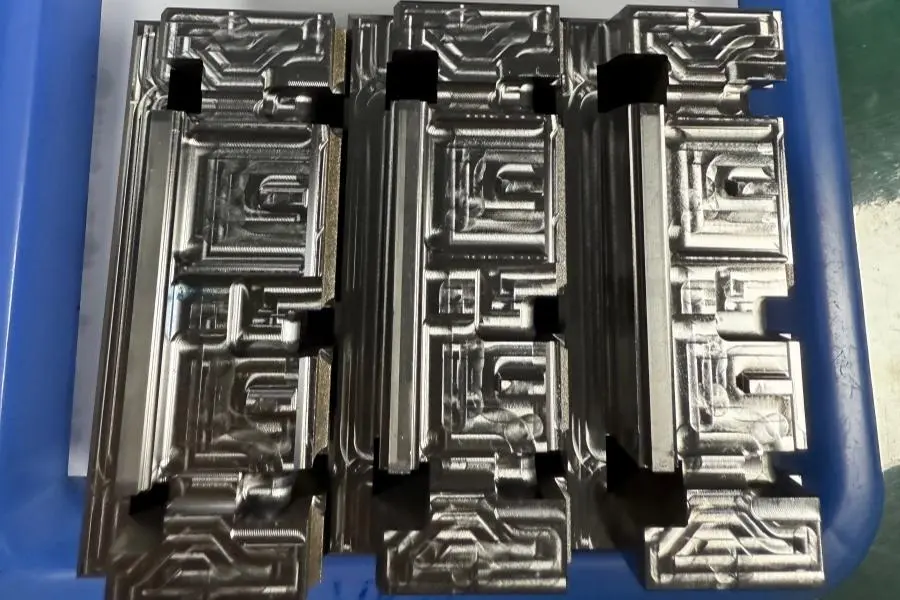 Precision machined mold components with complex CNC features